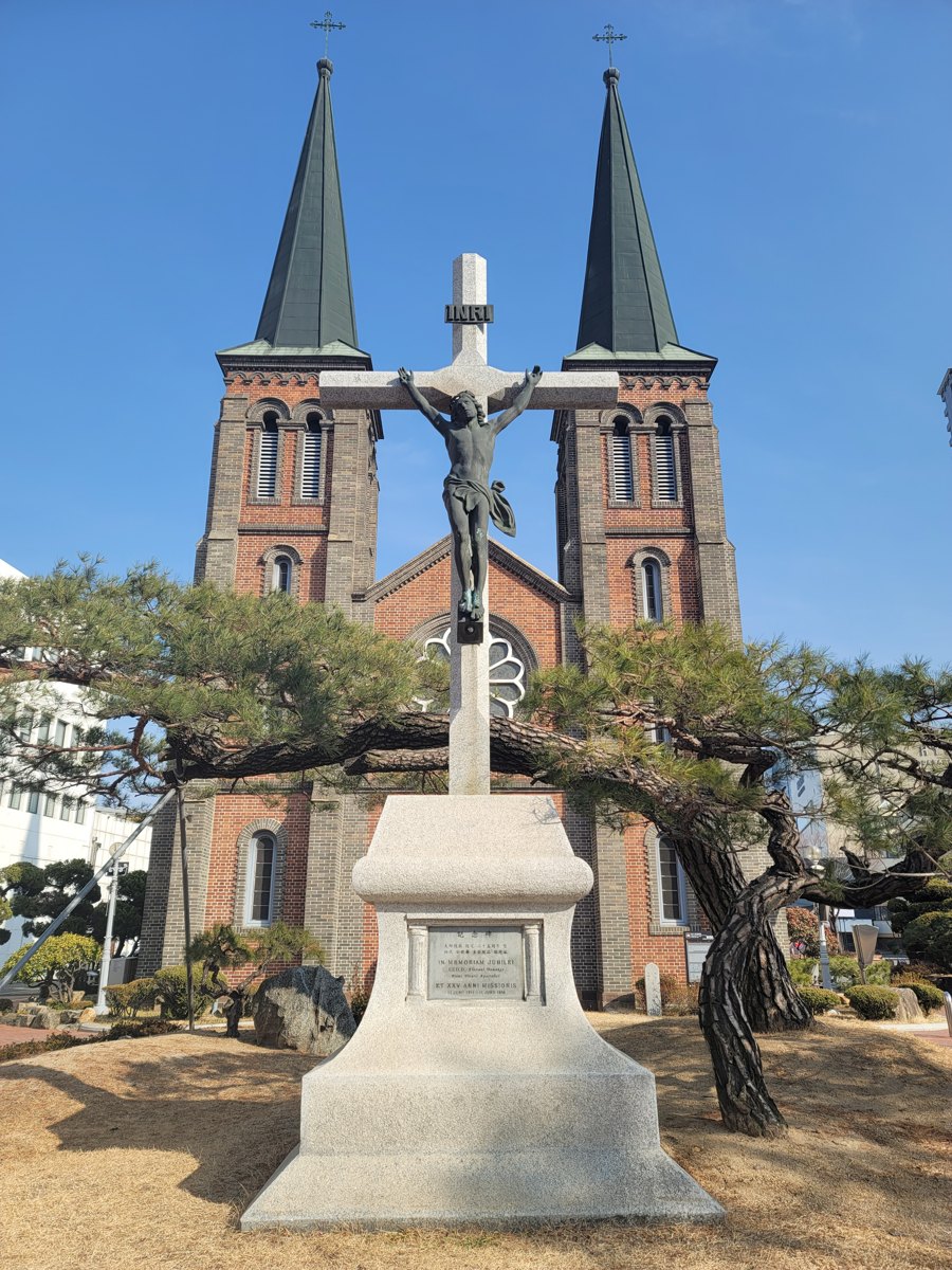 The twin spires of Gyesan Cathedral